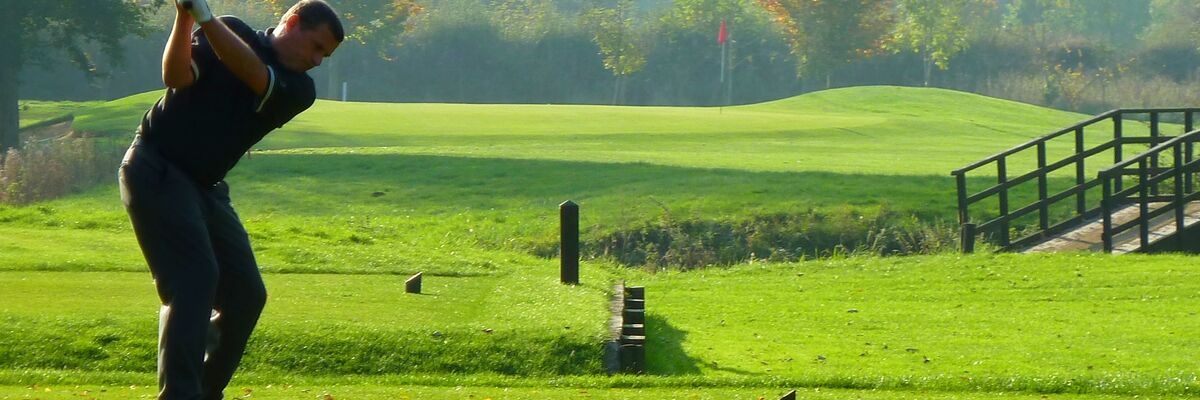 Teeing off over the river on 4th